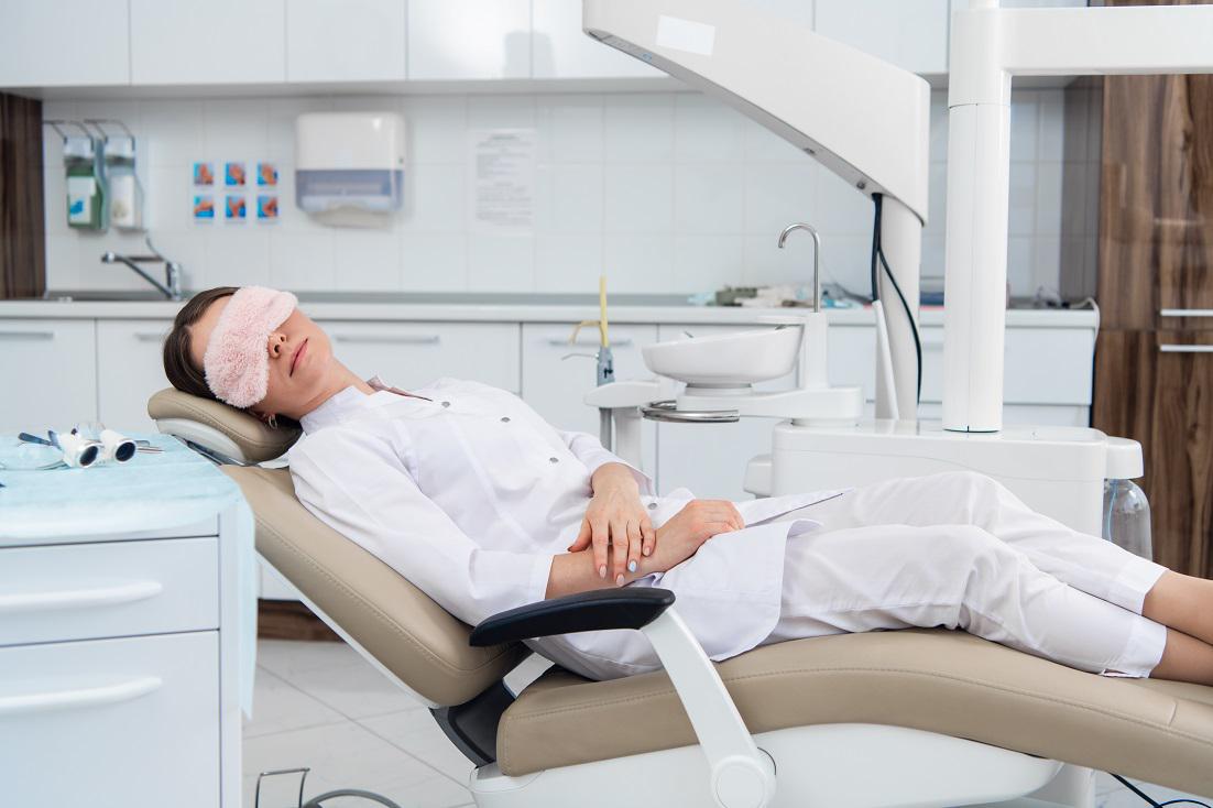 Image of a woman completely relaxed at the dentist | Sedation Dentistry in Antelope, CA